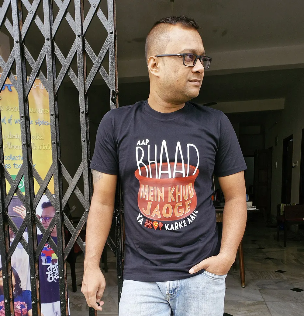 Man wearing Bhaad Mein Jao graphic T-shirt