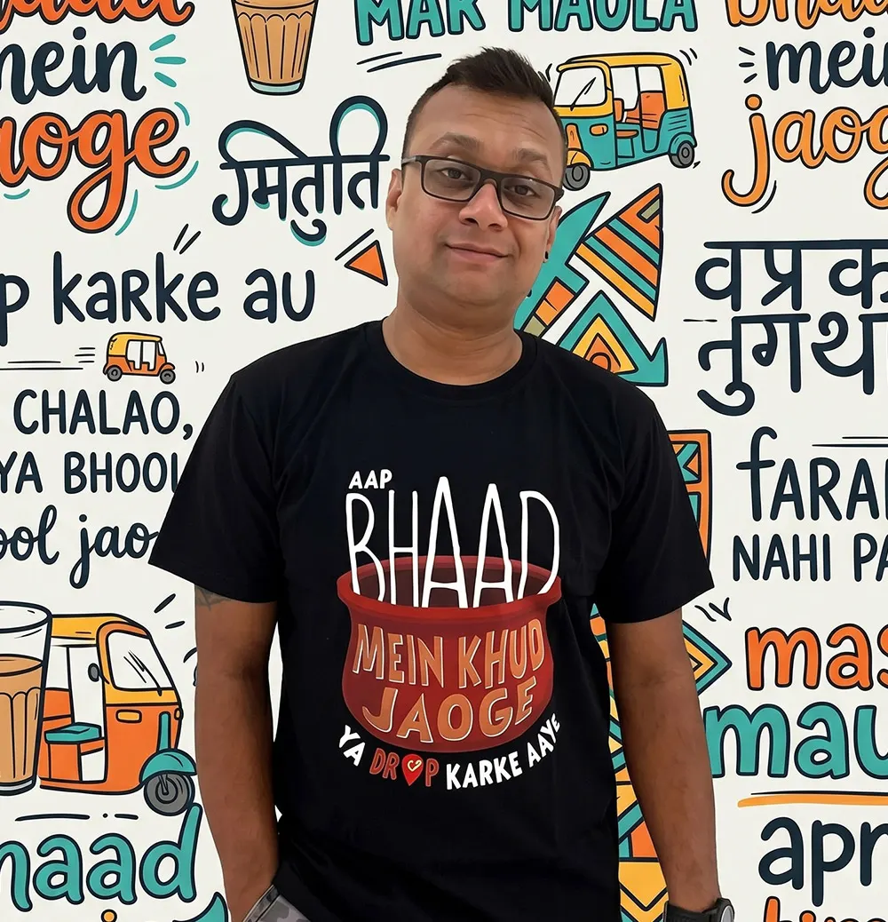Man modeling Bhaad Mein Jao graphic T-shirt