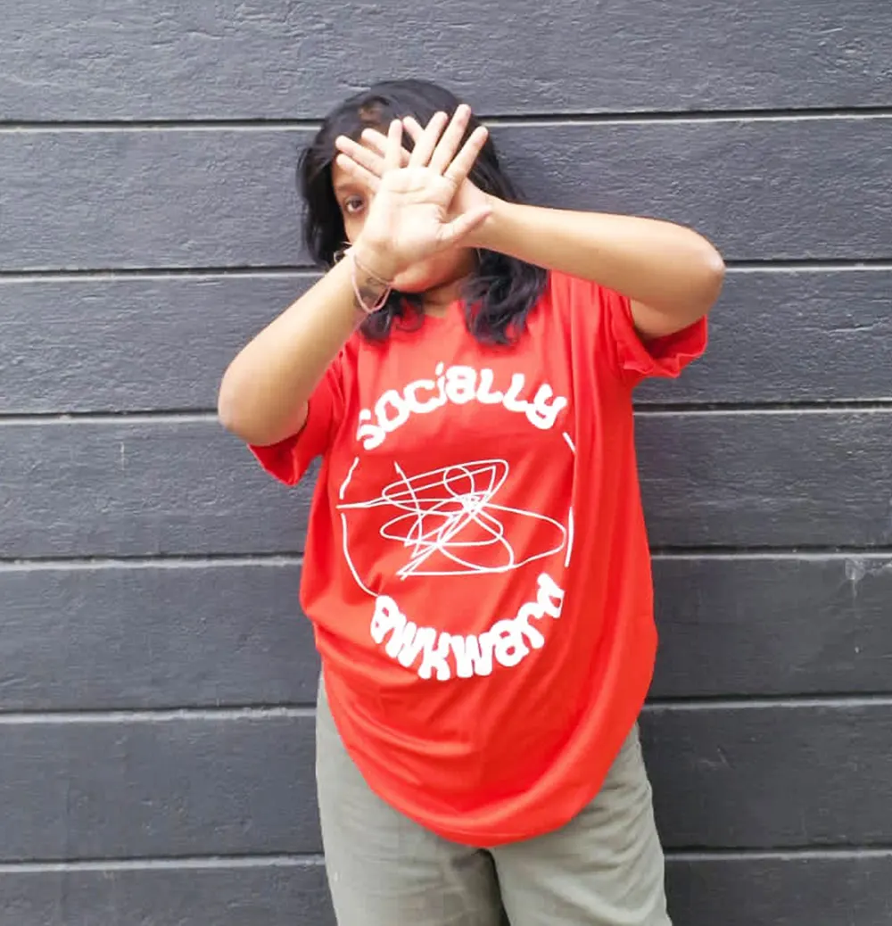 Woman modeling Socially Awkward printed T-shirt