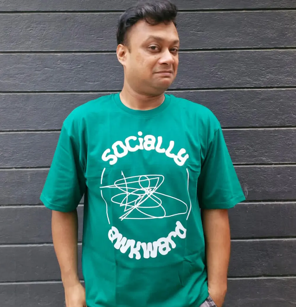 Man wearing Socially Awkward graphic T-shirt